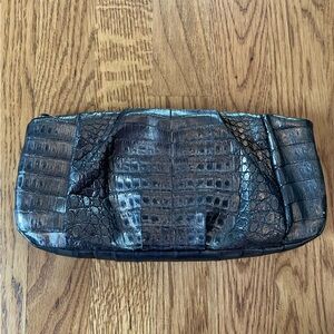 Nancy Gonzalez clutch